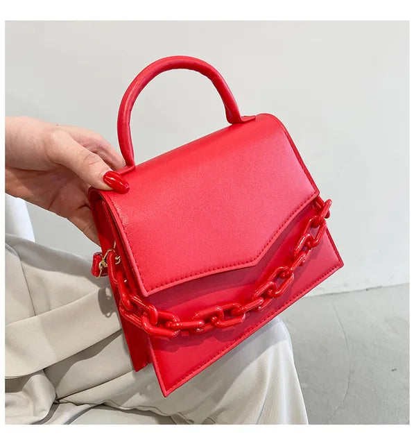 https://ae01.alicdn.com/kf/Sfb668ccc18e944348067cdb15c5fd185o/New-Chain-Shoulder-Bag-Designer-Handbags-for-Ladies-Solid-Color-Crossbody-Bags-for-Women-Fashion-Female.jpg_640x640.jpg