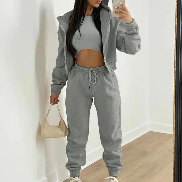 https://ae01.alicdn.com/kf/S6872257b2d7d409db66013cbc5f47945h/Women-3-Piece-Sets-Casual-Long-Sleeve-Zip-Hoodies-Ribbed-Tank-High-Waist-Sweatpants-Jogger-Pant.jpg_640x640.jpg